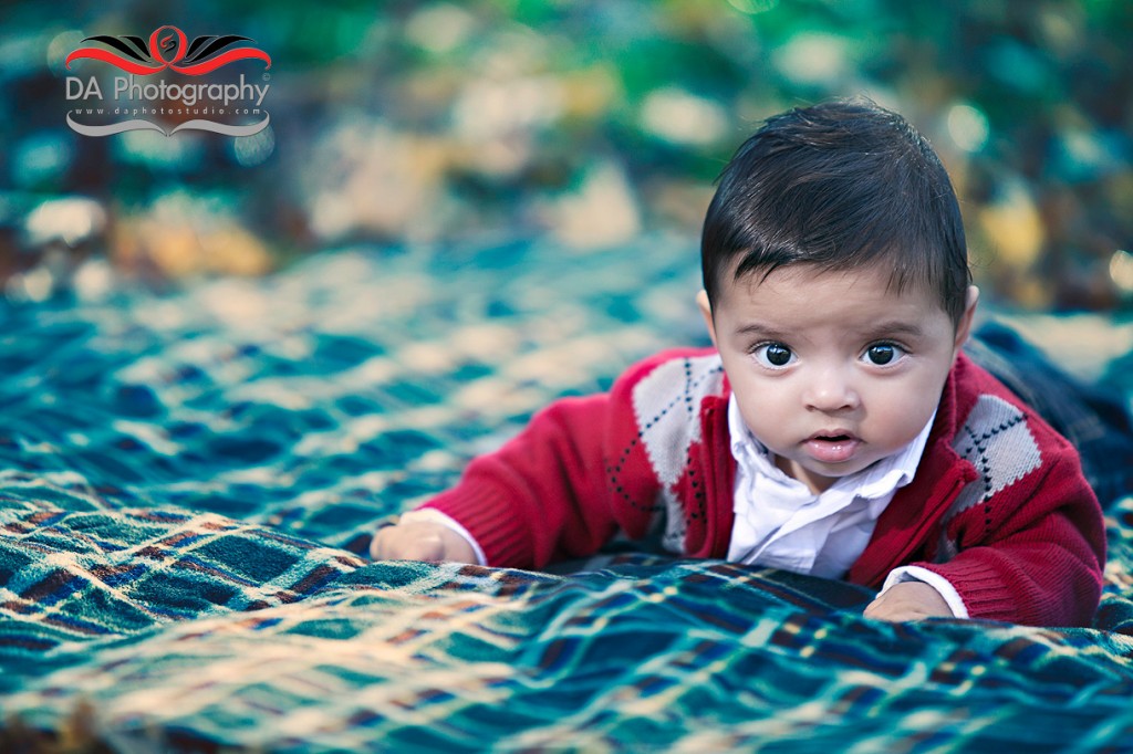 Baby boy at the picnic blanket