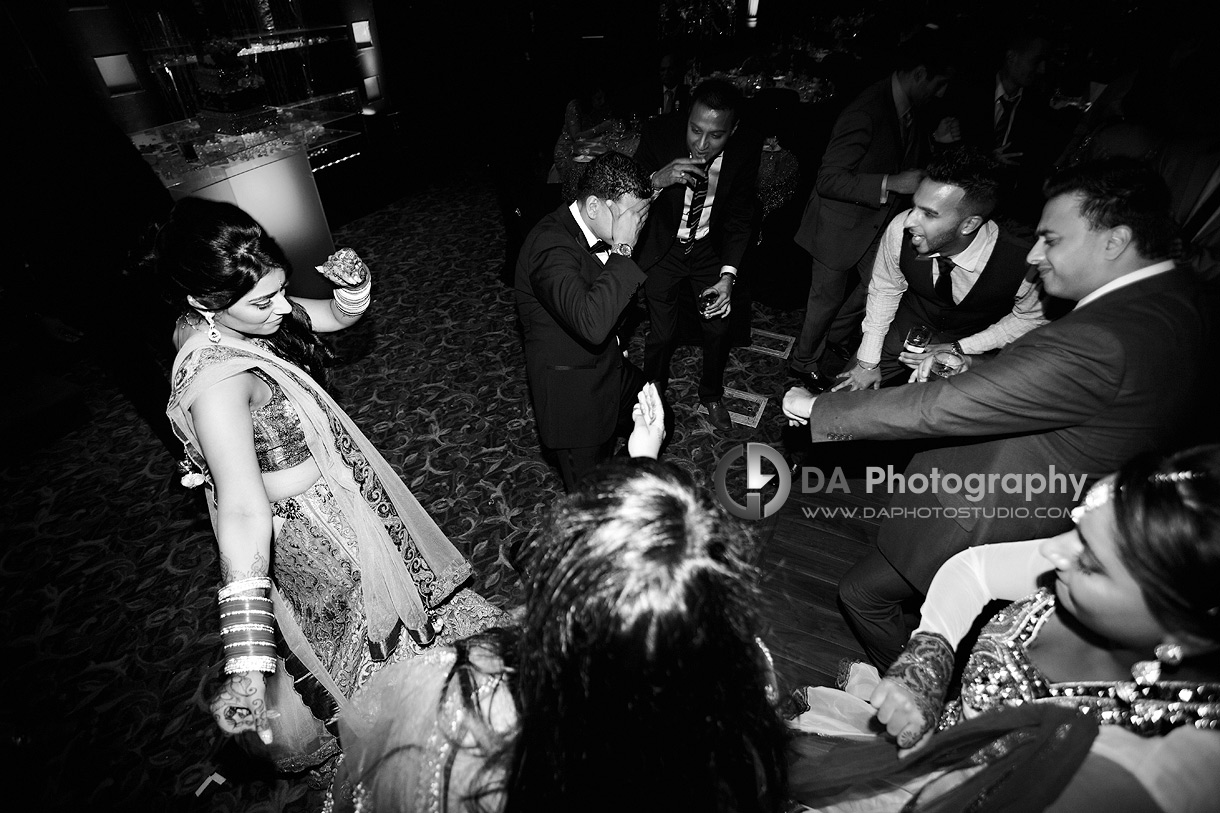 Bride and groom's timeless dance at their wedding reception in black and white