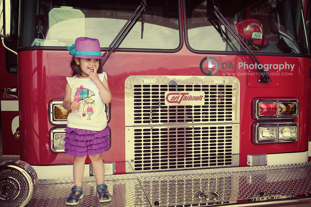 Girl on the firetruck