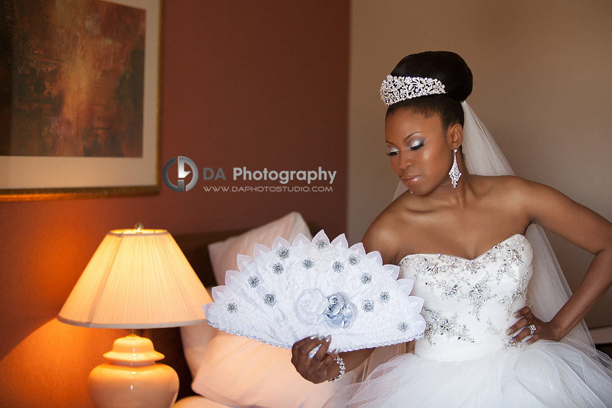 Bride Posing with Beloved Prop | Wedding Photography