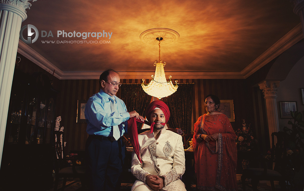 Wrapping the turban Sikh ceremony - Sikh Indian Wedding Photographer