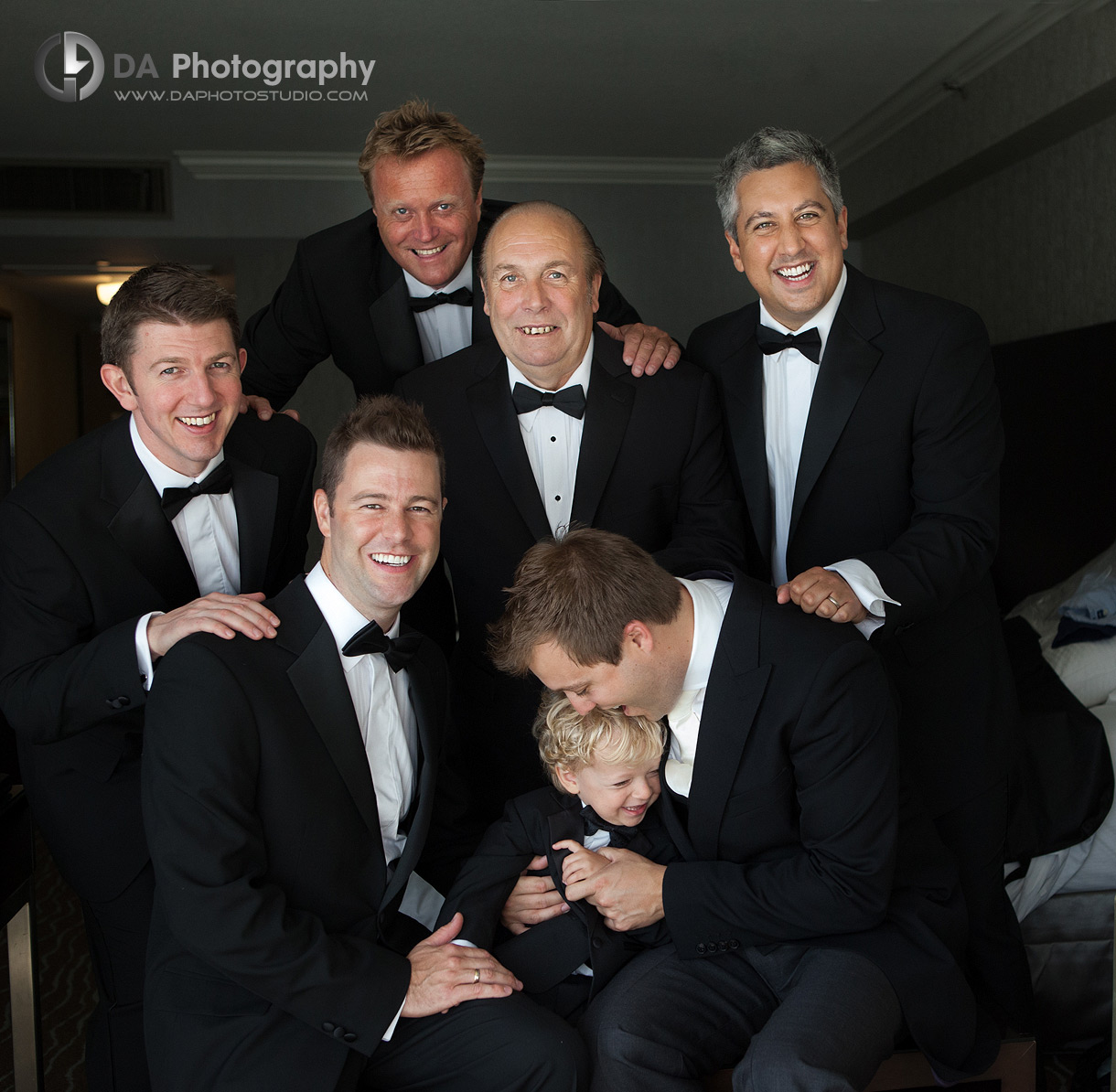 The fun withe the groom with his groom mans My last Name - Wedding Photographer