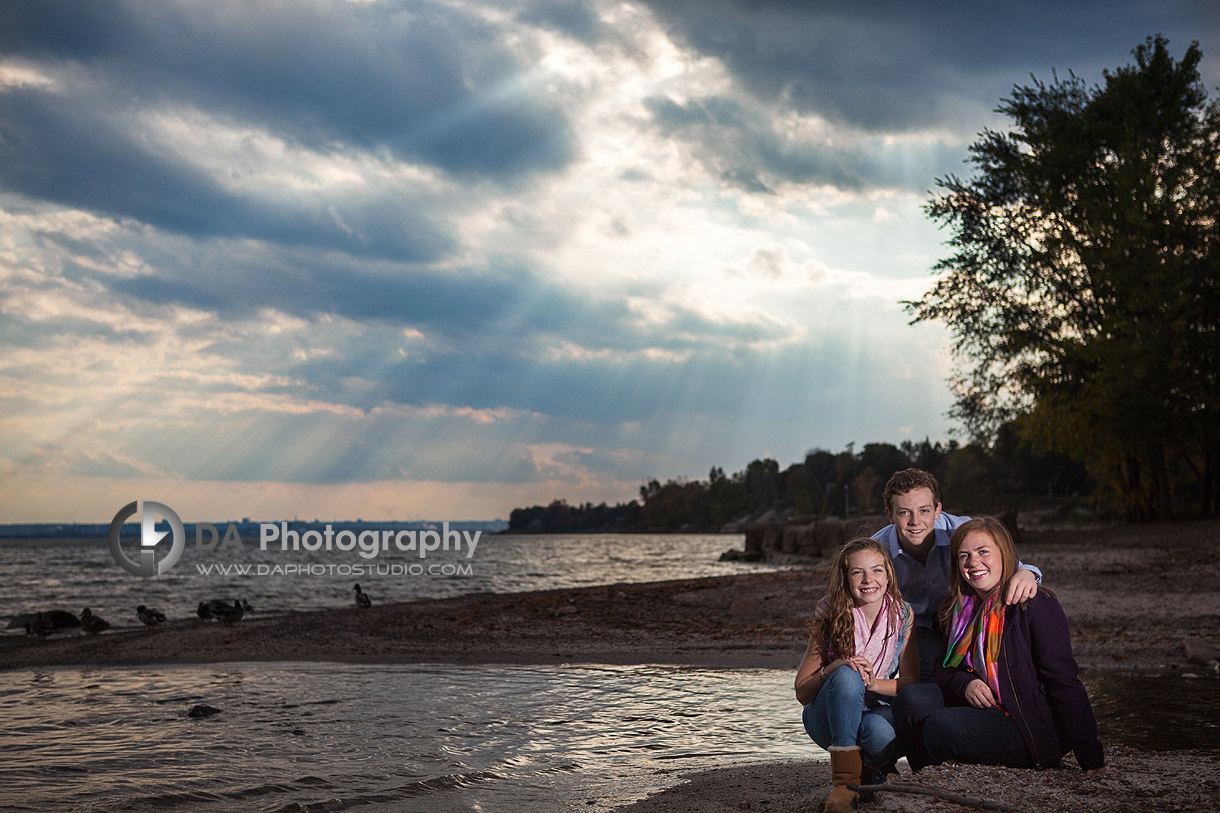 Siblings Portrait, by the lake with dramatic sky - Family Photographer - DA Photography