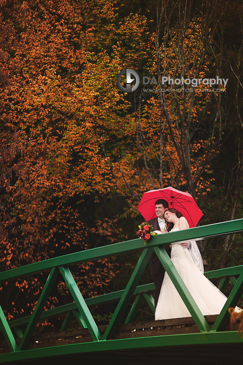 Wedding couple at the bridge at Caledon Golf and Country Club - Wedding Photographer