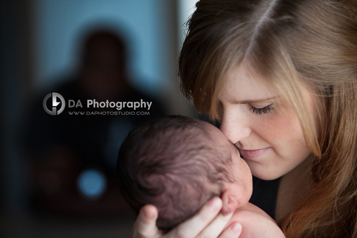 Happy Mom with her newborn - Family Local Photographer