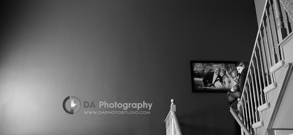 Family portrait by the wedding wall portrait display - Family Local Photographer