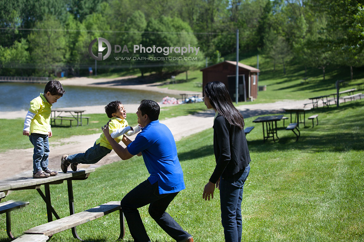 Family portrait jumping of the table, fun - Family Photographer