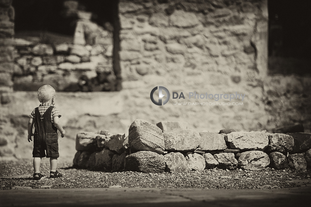 Toddler and rocks - Family Photographer on Location