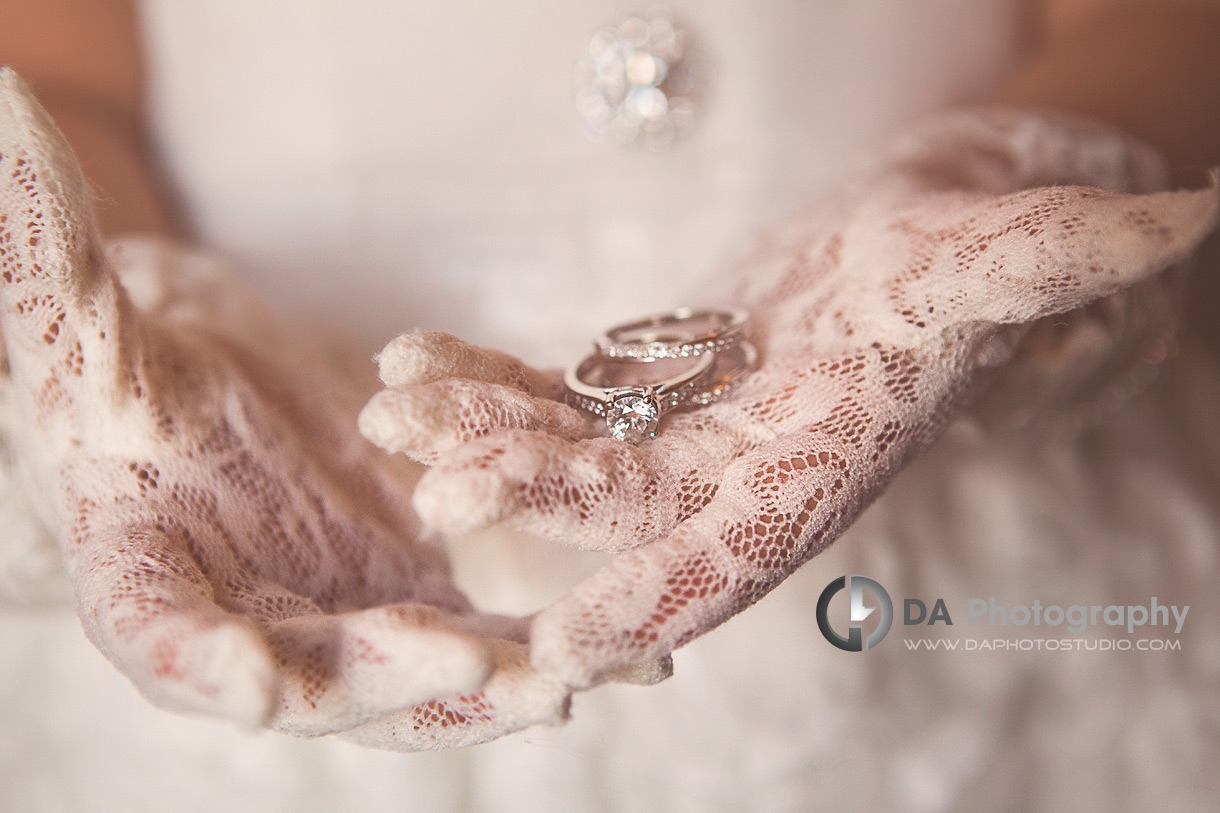 Wedding Rings in Gloved Hands - Wedding Photography by Dragi Andovski - Terrace On The Green - Brampton, ON