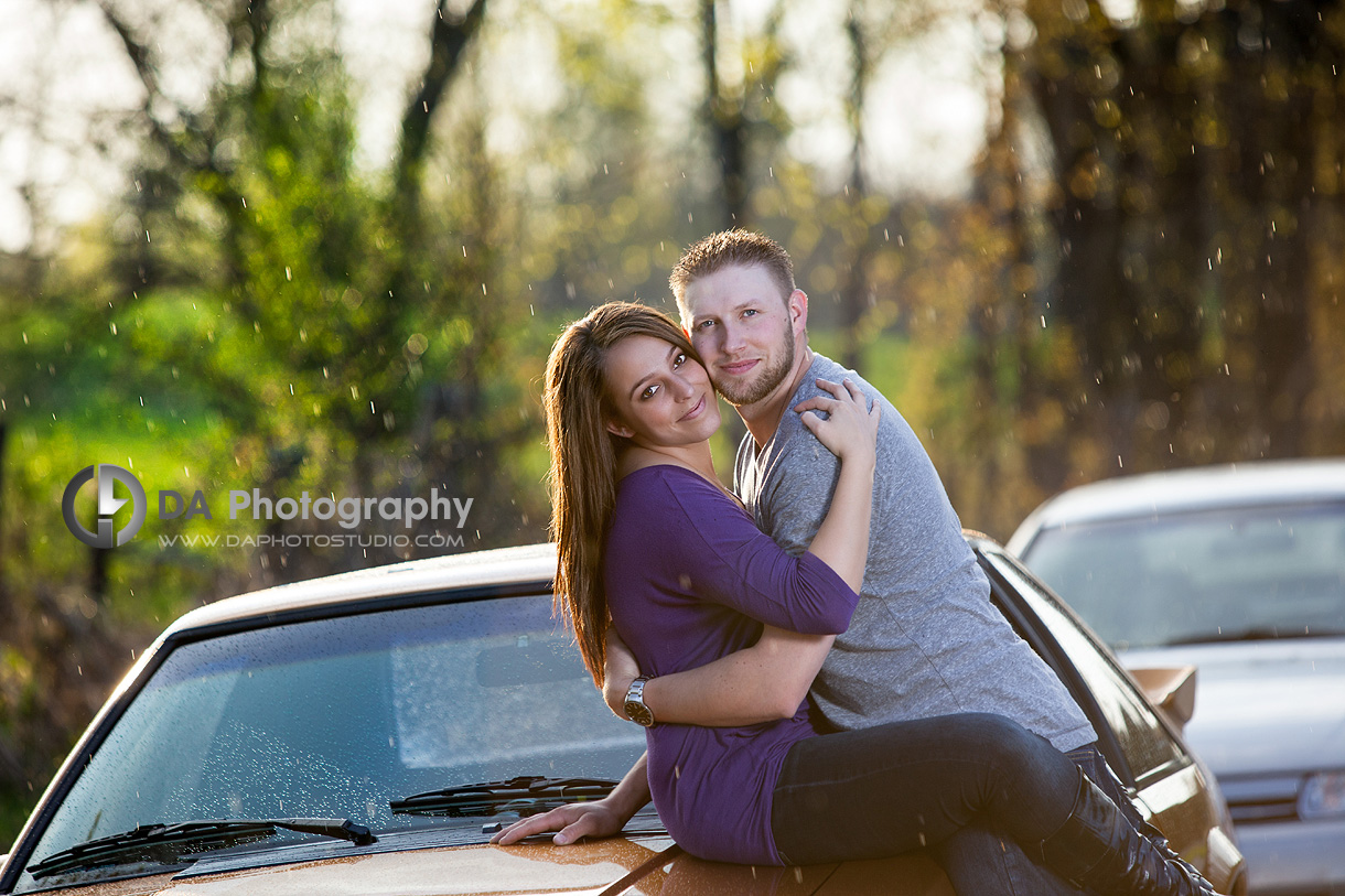 Rain, Sunset and Couple in love at their car - Wedding Photography by Dragi Andovski - Badlands - Brampton, ON