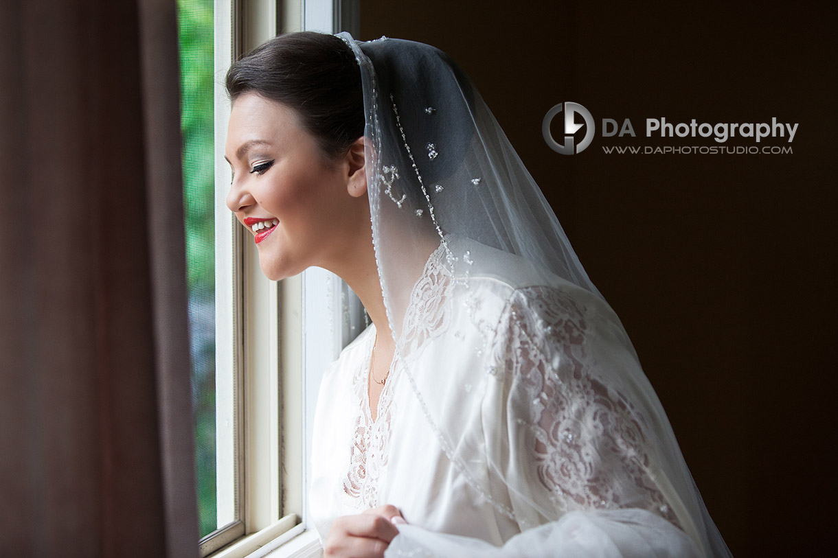 Bride Peeking Out The Window Before Getting Ready - Wedding Photography by Dragi Andovski - Hamilton, ON