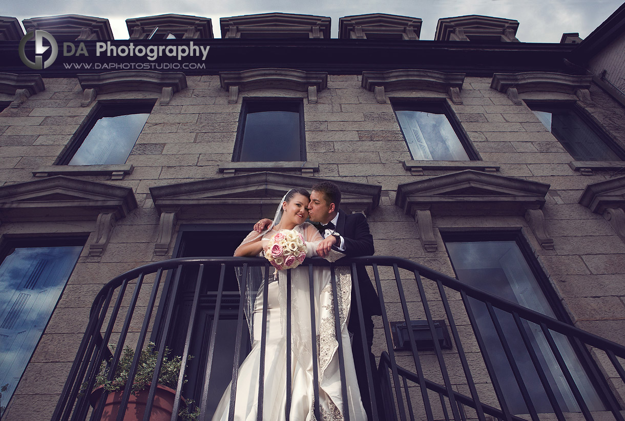 Bride and Groom Photo with Dramatic Architecture - Wedding Photography by Dragi Andovski - Hamilton, ON