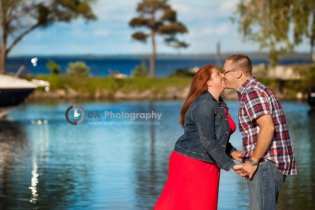 Engaged Couple's Kiss at the Waterfront in Barrie - Family Photography by Dragi Andovski - Barrie, ON