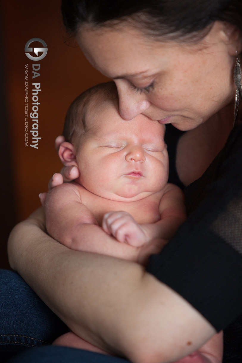 Mommy and her newborn baby boy cuttle time- Details in Newborn photography by DA Photography - www.daphotostudio.com