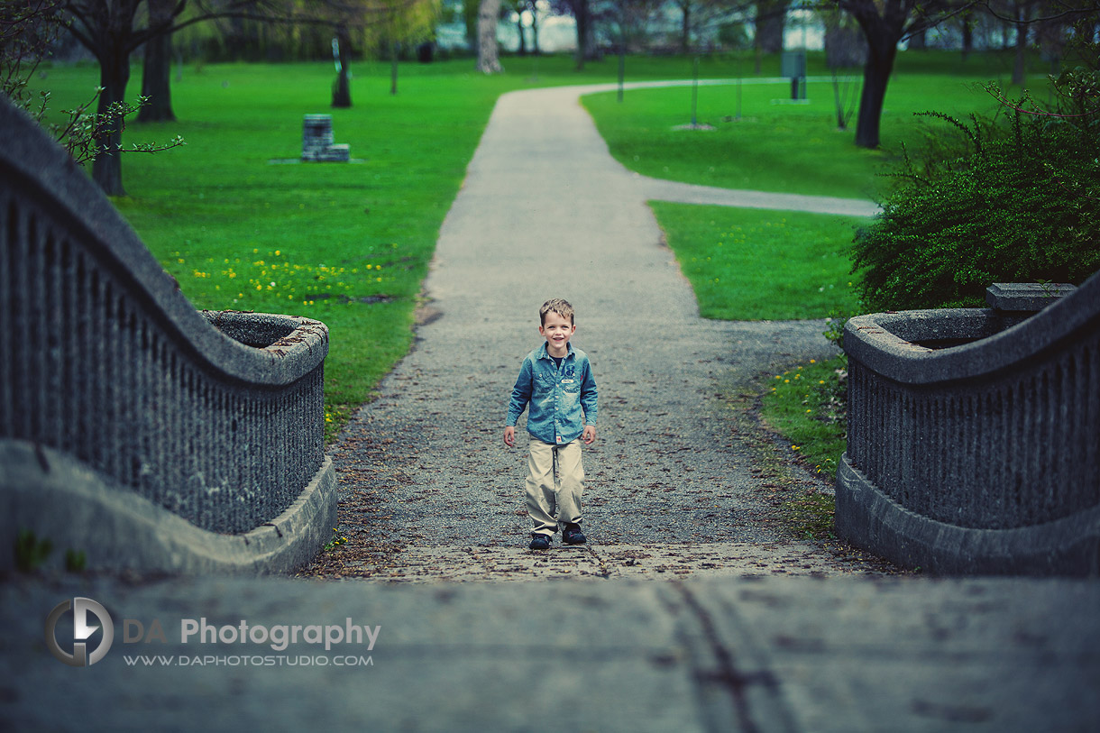 Boy play at Toronto Island bridges captured in photo documentary style  - DA Photography at Toronto Islands, www.daphotostudio.com