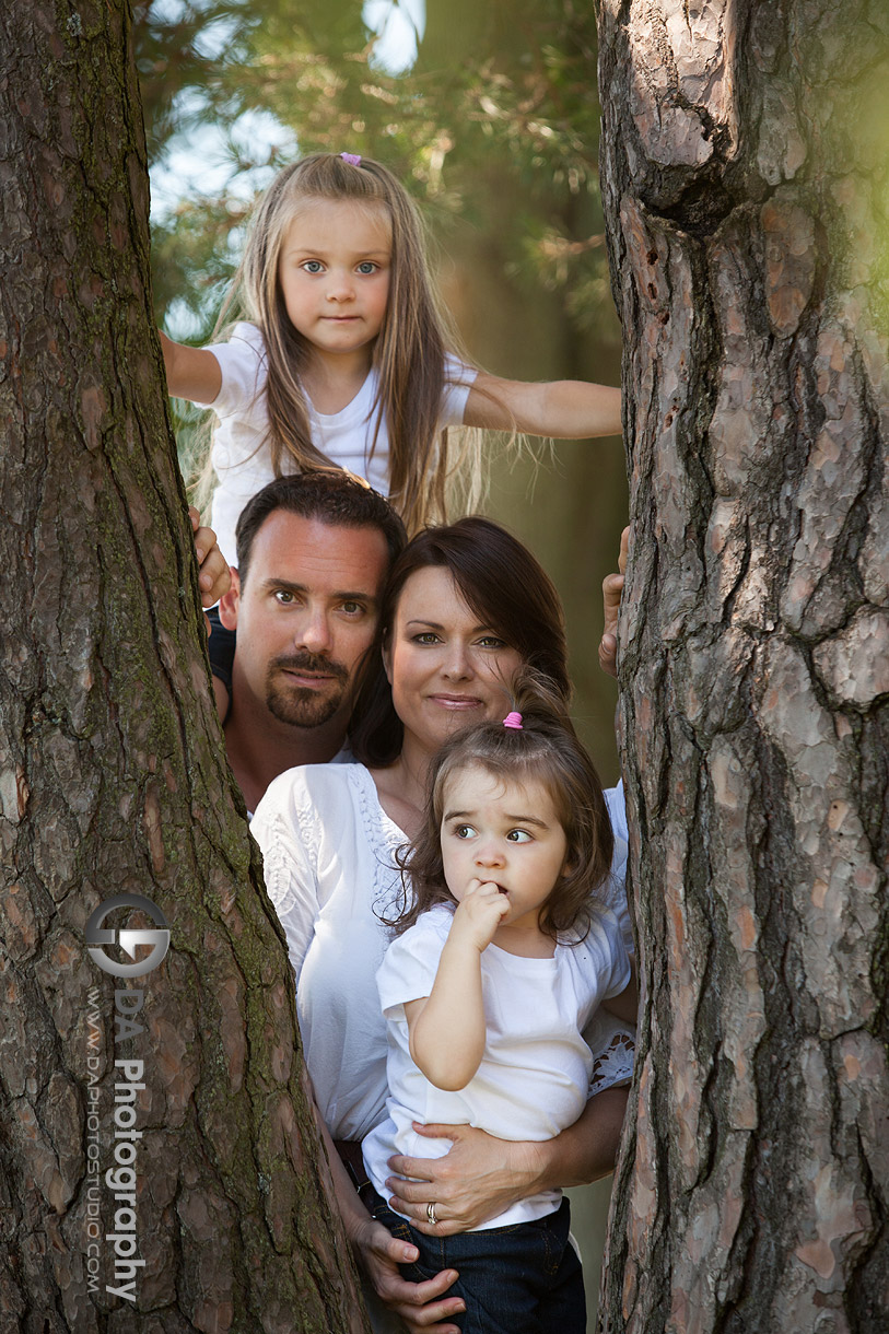 Family portrait by the tree - at Gairloch Gardens, Oakville by DA Photography , www.daphotostudio.com