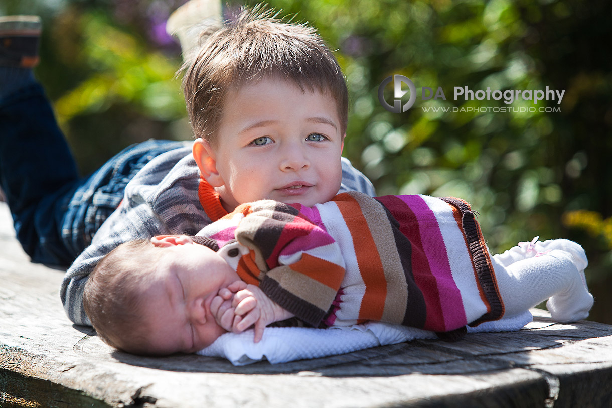 Little boy with his newborn baby sister - Heart Lake Conservation Area, Brampton by DA Photography ,Newborn Photography