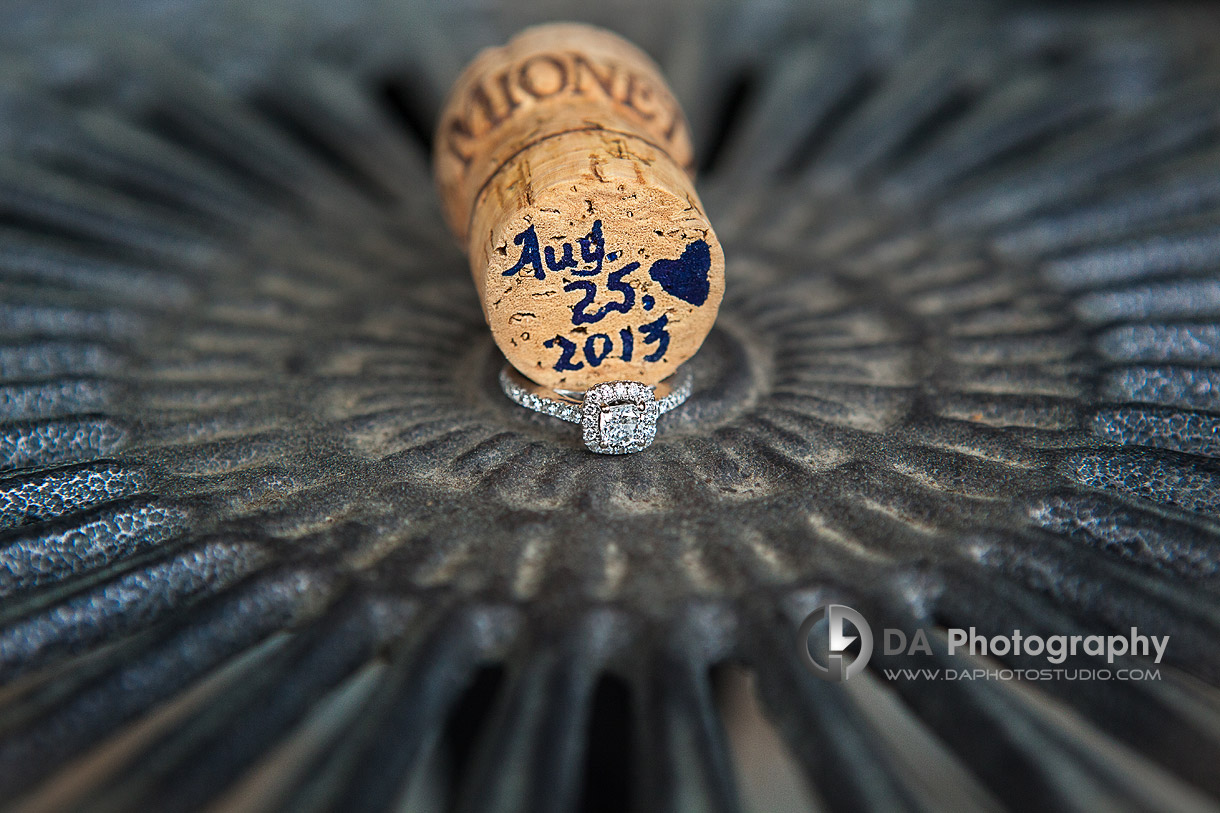 Engagement date and ring to a celebration champagne cork - Wedding Photography by Dragi Andovski at Erchelss Estate, Oakville