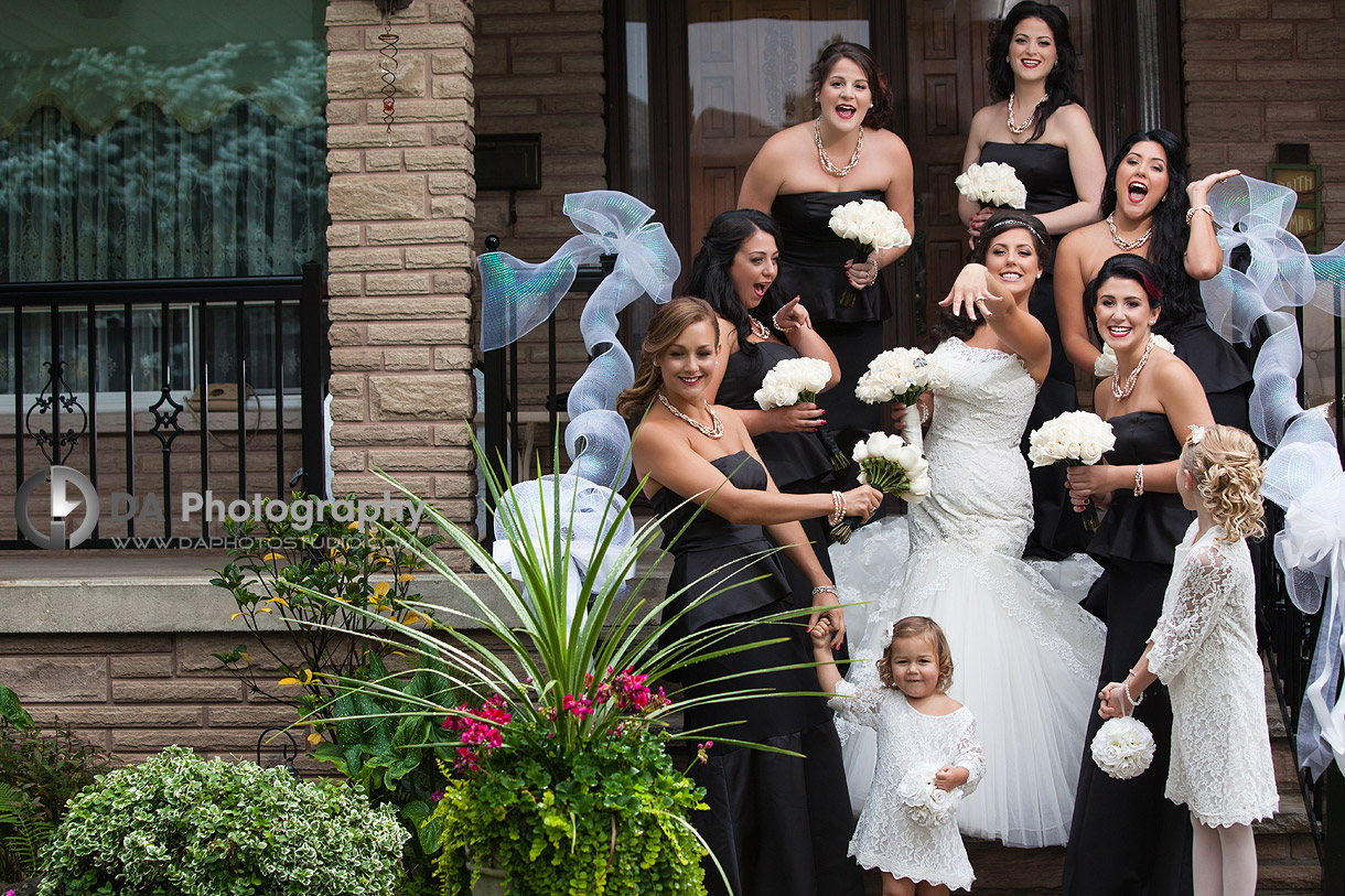 Bride with her bridal party showing her engagement ring - Wedding Photography by Dragi Andovski at Erchelss Estate, Oakville