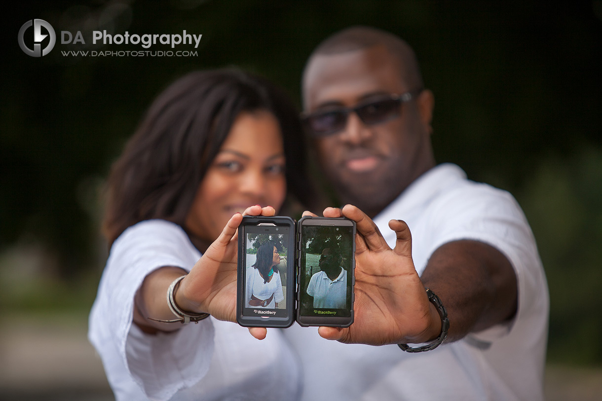 Couple Portrait with their blackberry's - Engagement by DA Photography at Gairloch Gardens, ON, www.daphotostudio.com