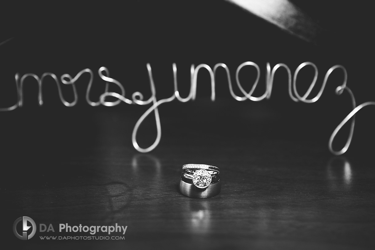 The wedding rings and their let name on a coat hanger - by DA Photography at Black Creek Pioneer Village, www.daphotostudio.com