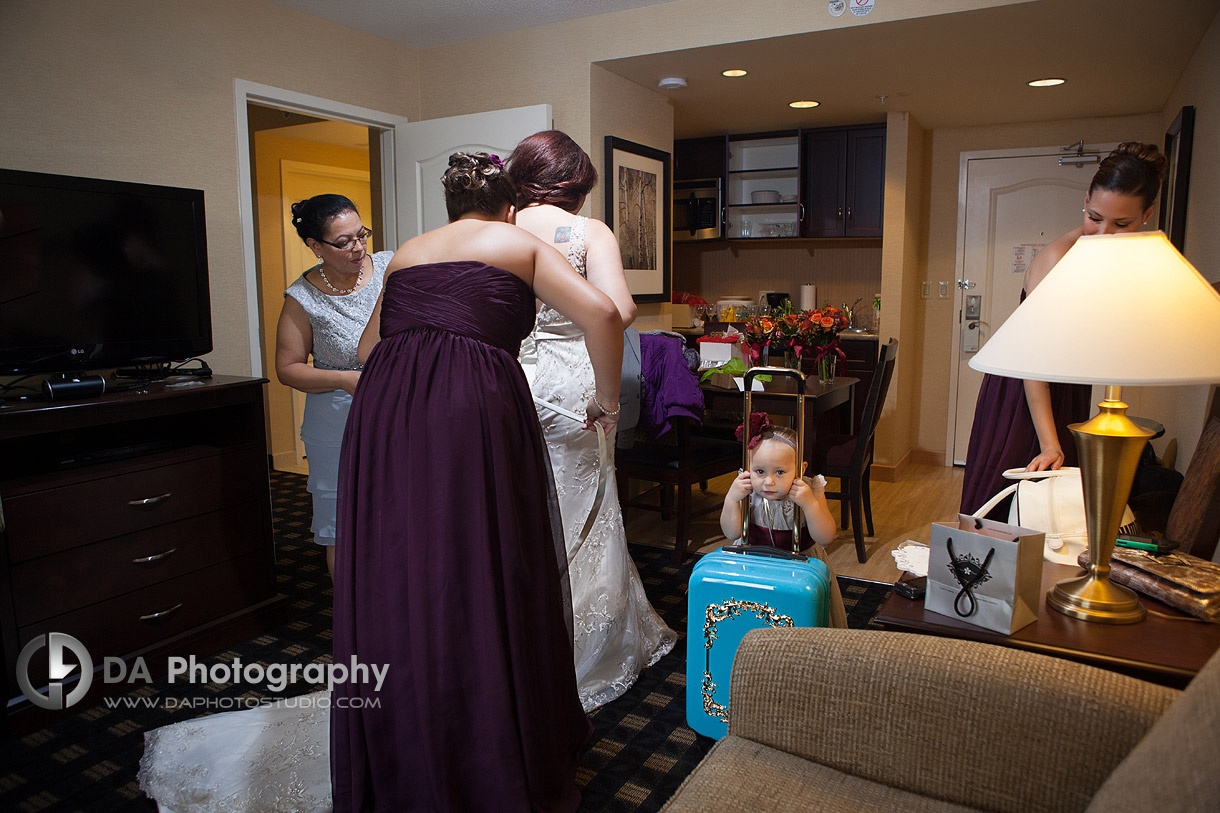 Getting ready and the flower girl - by DA Photography at Black Creek Pioneer Village, www.daphotostudio.com