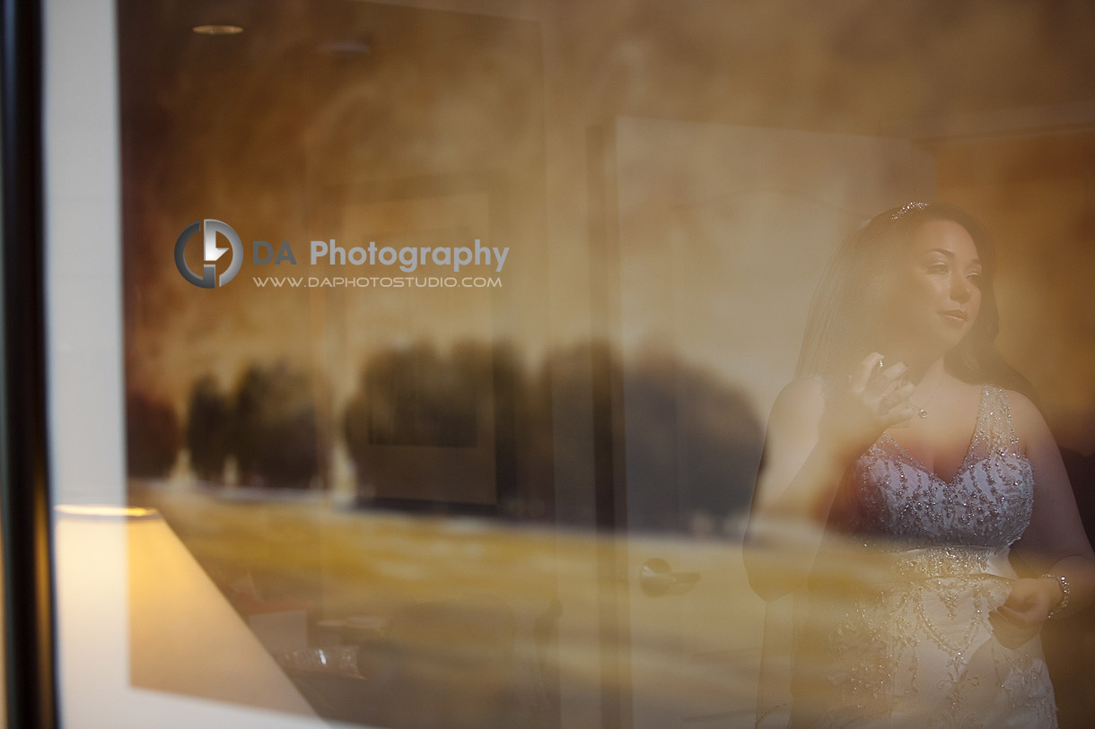 Bride's reflection from a wall painting - by DA Photography at Black Creek Pioneer Village, www.daphotostudio.com