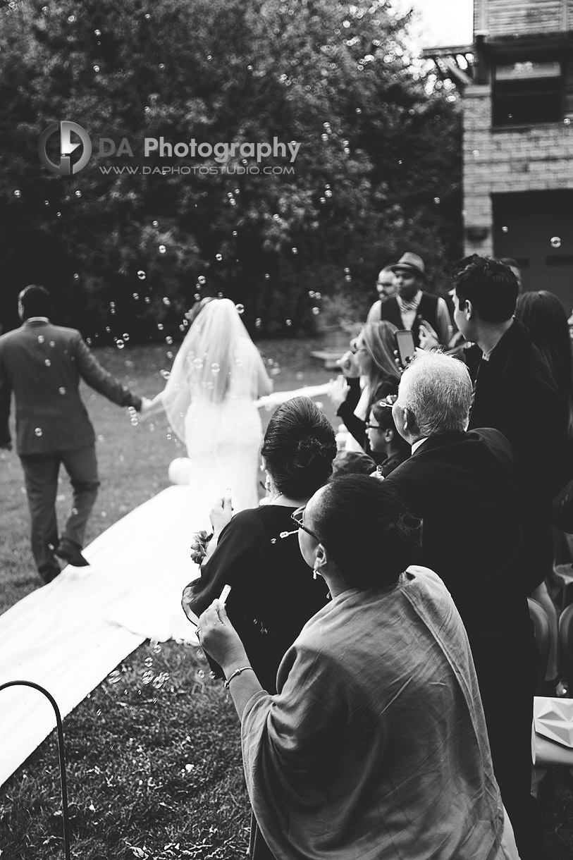 Walking down the aisle after the ceremony - by DA Photography at Black Creek Pioneer Village, www.daphotostudio.com