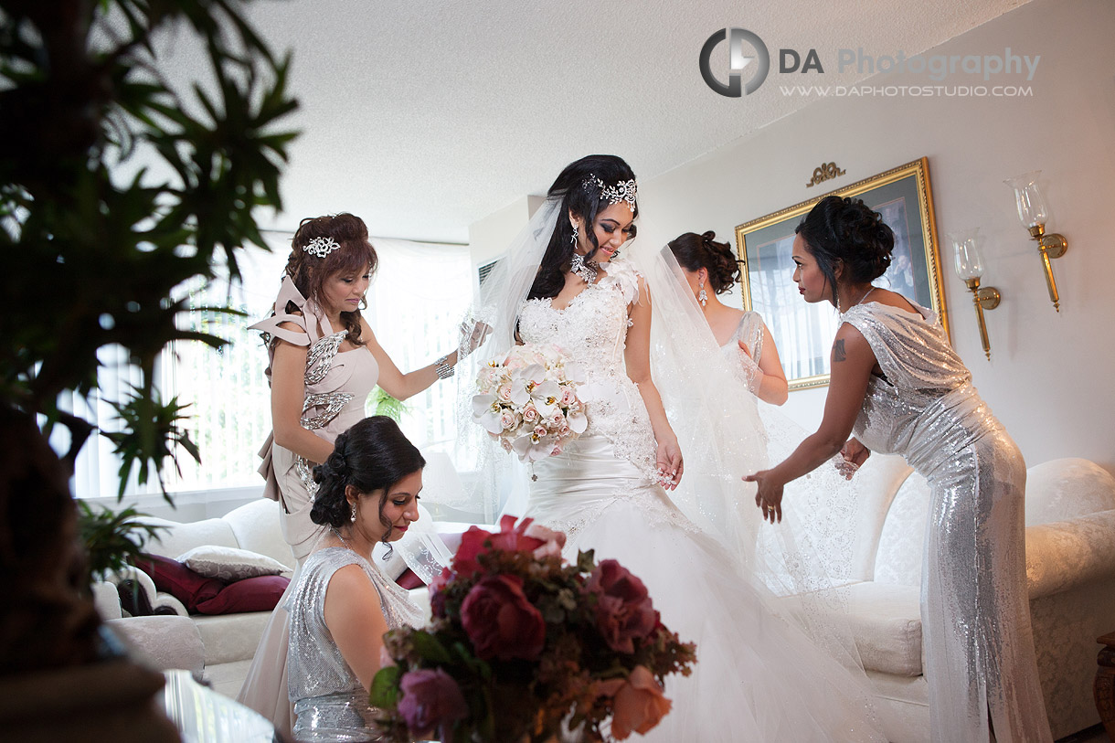 Wedding Day, bride is getting ready and helped by her bridesmaids - by DA Photography at West River, www.daphotostudio.com