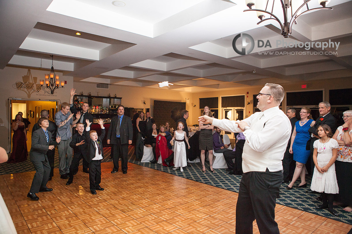 Toast of the garter - Blended Family in Fall wedding by DA Photography, www.daphotostudio.com