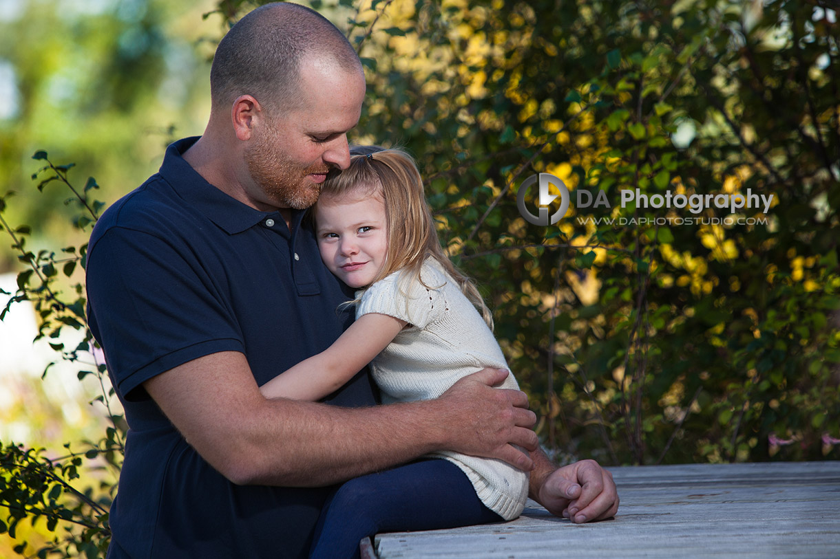 Dad with his daughter at the old railroad station in Sutton - Thanksgiving Fall Portraits by DA Photography - www.daphotostudio.com