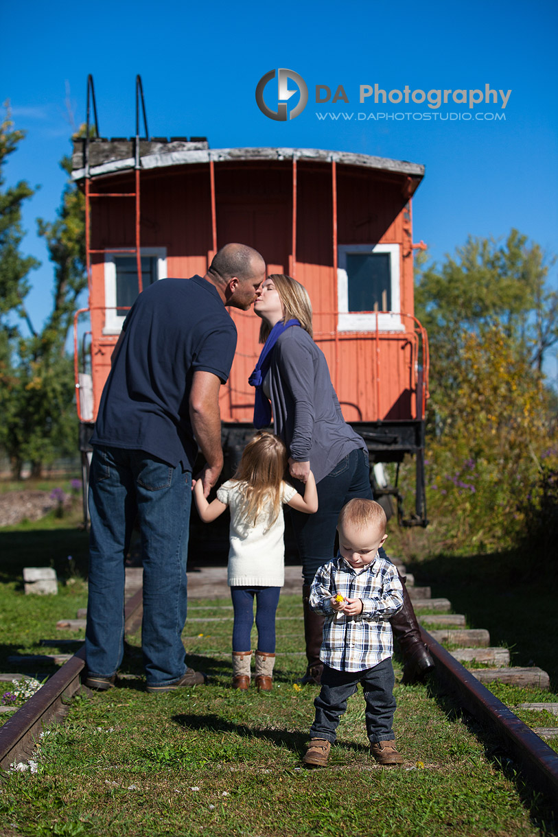 Family Portrait and the toddler at the old railroad station in Sutton - Thanksgiving Fall Portraits by DA Photography - www.daphotostudio.com