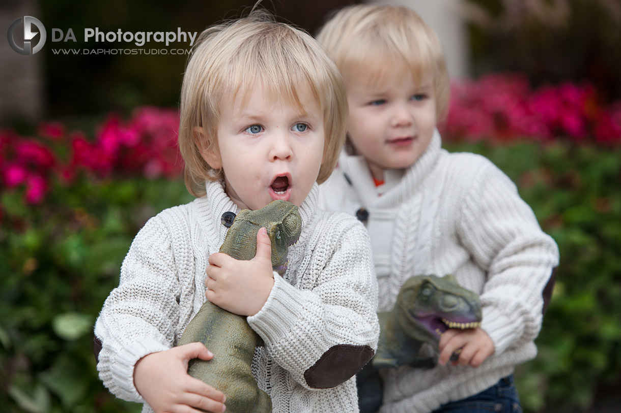 Brothers at their dinosaur toys - Professional photos by DA Photography at Paletta Mansion, Burlington - www.daphotostudio.com