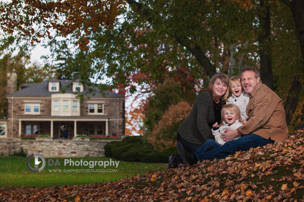 Family portrait under the tree in fall - Professional photos by DA Photography at Paletta Mansion, Burlington - www.daphotostudio.com