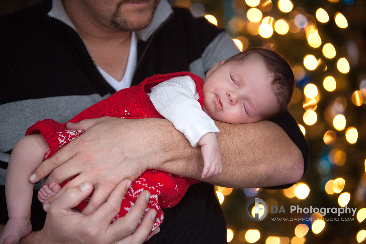 The little girl asleep in daddy's hands - Christmas and Holiday card photos by DA Photography - www.daphotostudio.com 