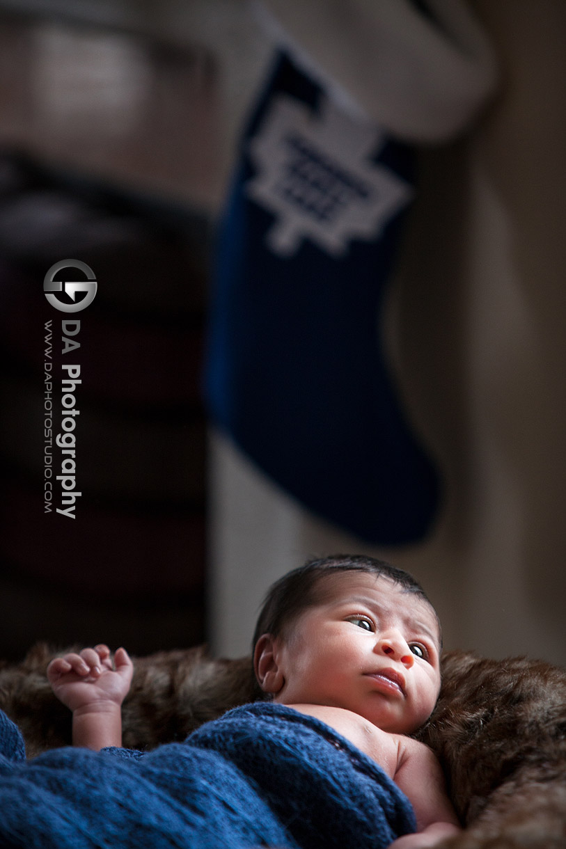 Maple Leaf strongest Fan - Newborn baby photos by DA Photography - www.daphotostudio.com