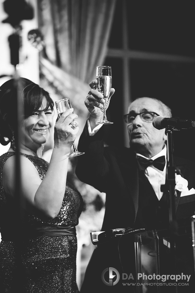 Salute, Mom and dad giving a speech - Winter wedding at Liberty Grand by DA Photography , www.daphotostudio.com