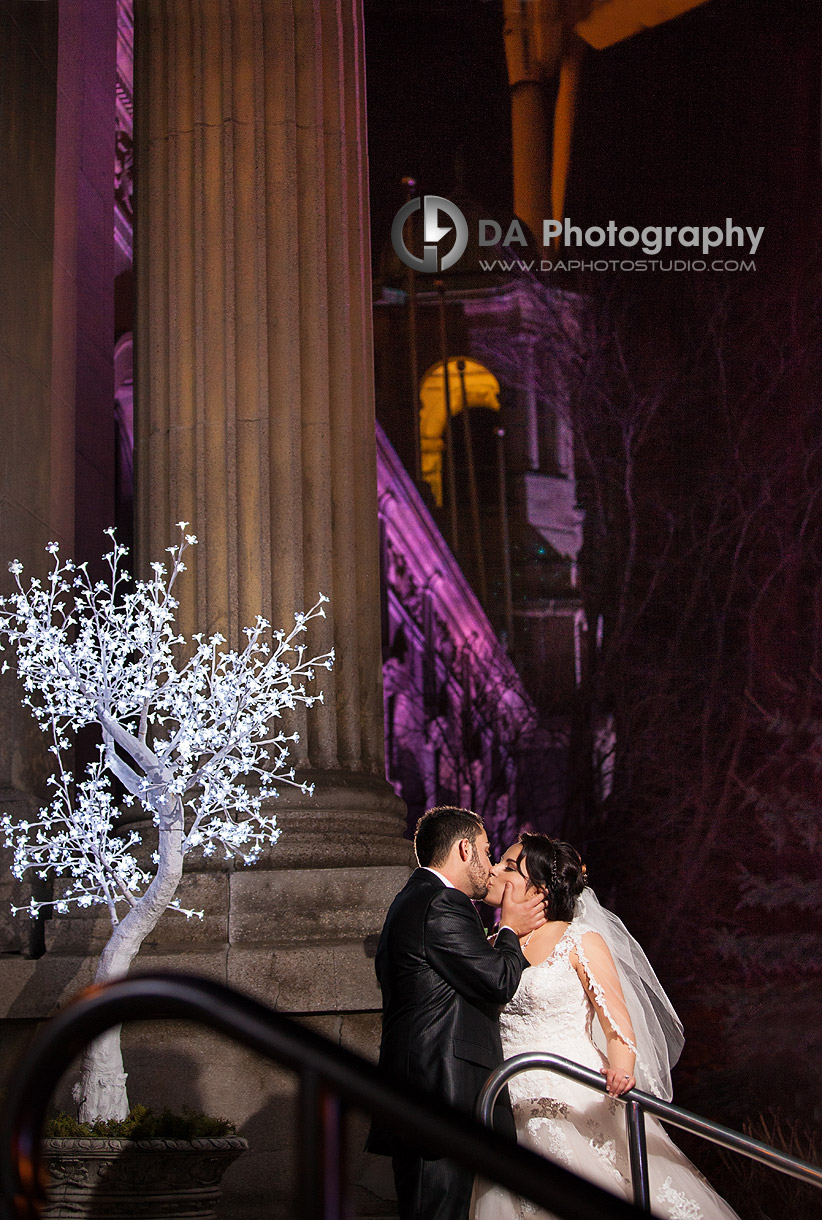 A night kiss - Winter wedding at Liberty Grand by DA Photography , www.daphotostudio.com