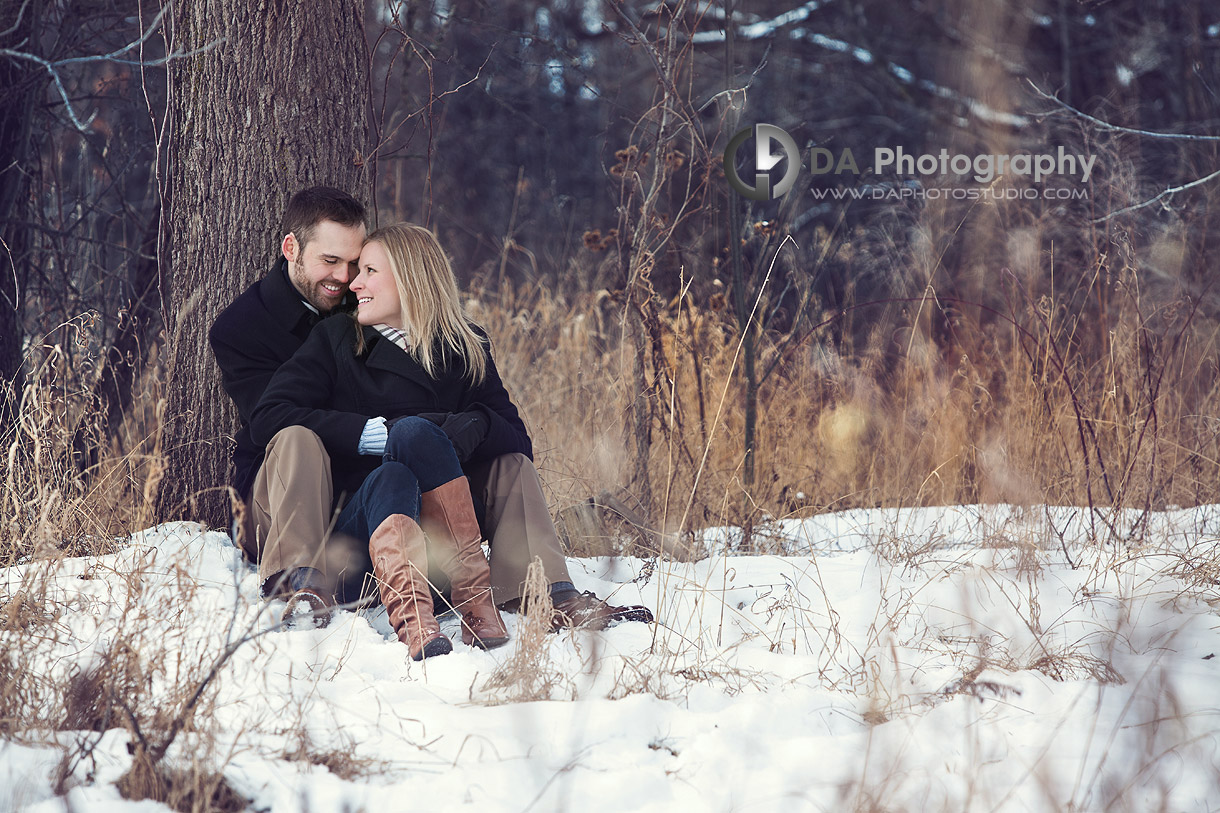 Winter Snuggle under the Tree - Winter Engagement photo shoot by DA Photography, www.daphotostudio.com