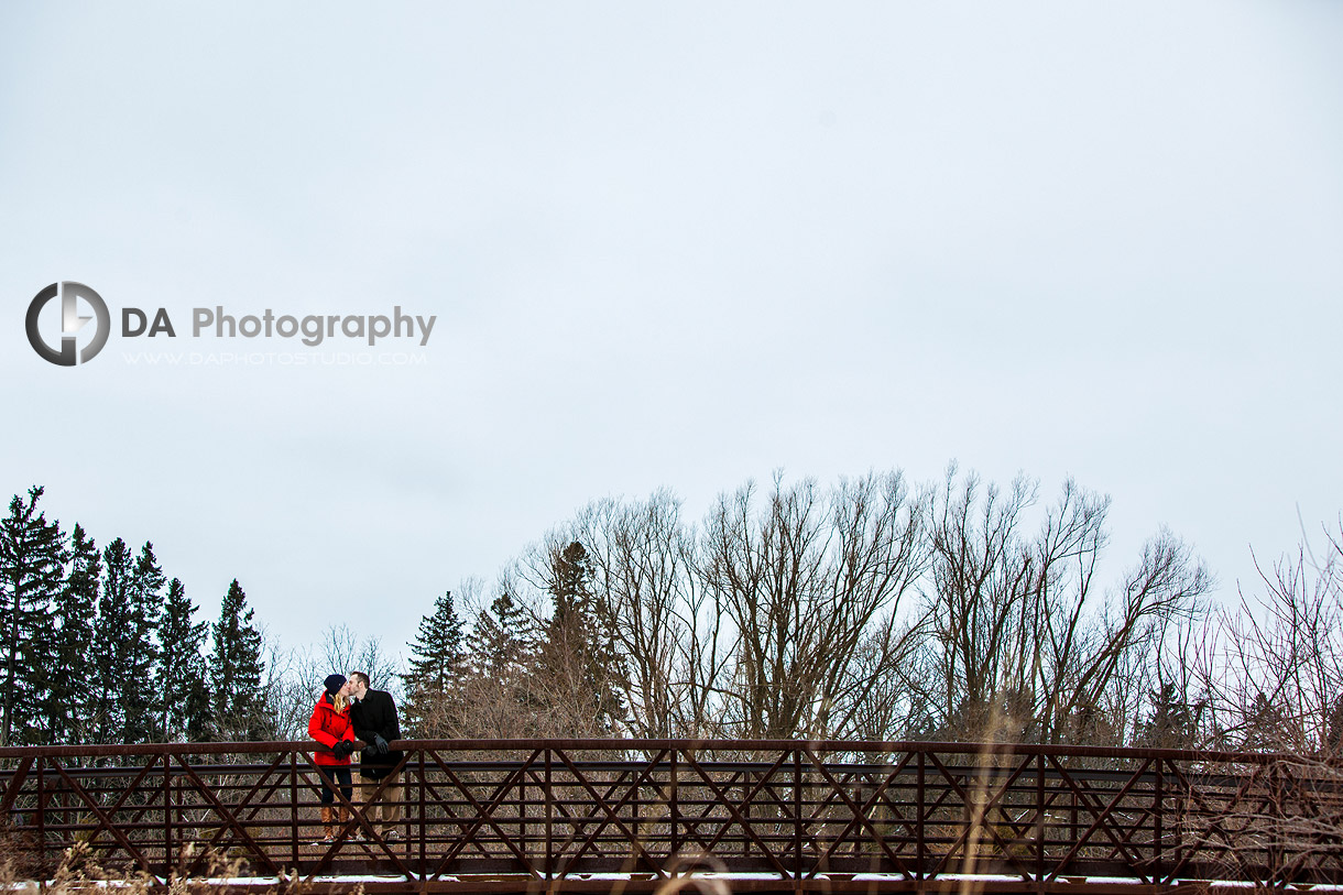 The Kiss on the bridge - Winter Engagement photo shoot by DA Photography, www.daphotostudio.com