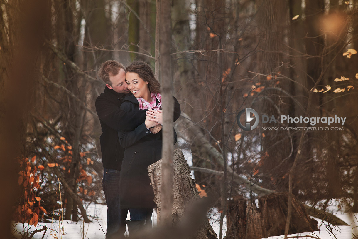 Warm Embrace on a Cold Day - Romantic engagement photos by DA Photography at Parish Ridge Stables in Burlington , www.daphotostudio.com