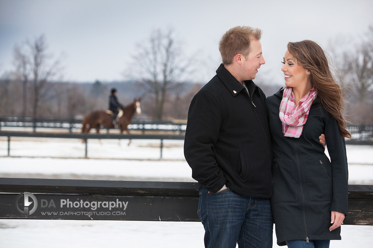 Happy Couple on a Winter's Day - Romantic engagement photos by DA Photography at Parish Ridge Stables in Burlington , www.daphotostudio.com