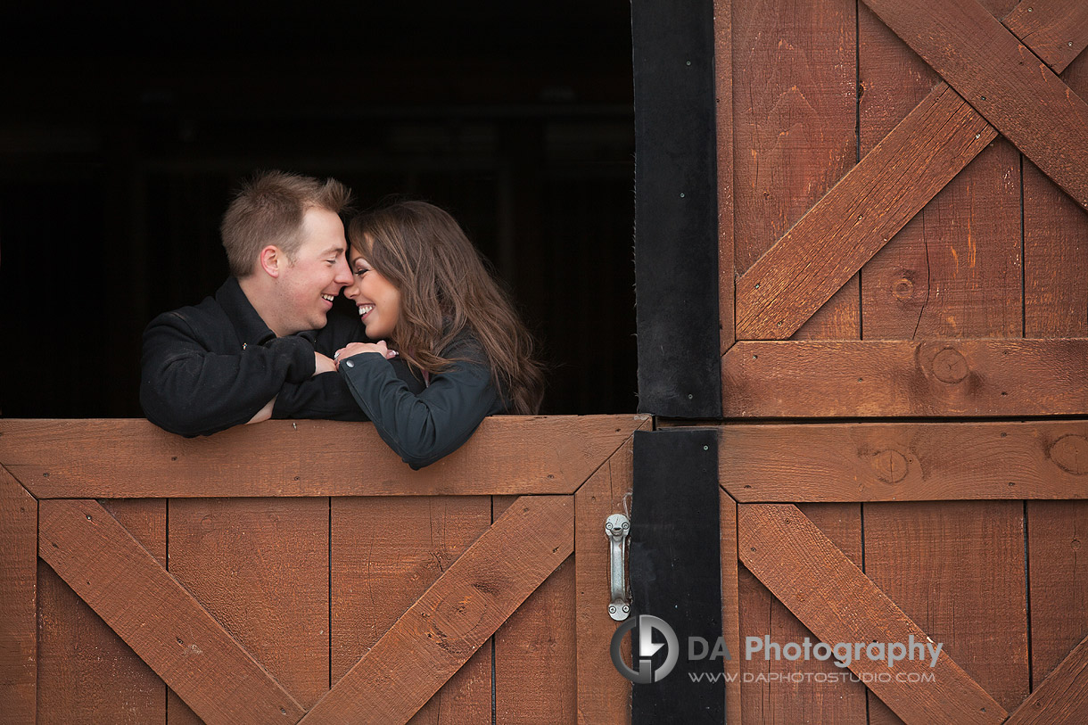 A Moment at the Stable Door - Romantic engagement photos by DA Photography at Parish Ridge Stables in Burlington , www.daphotostudio.com