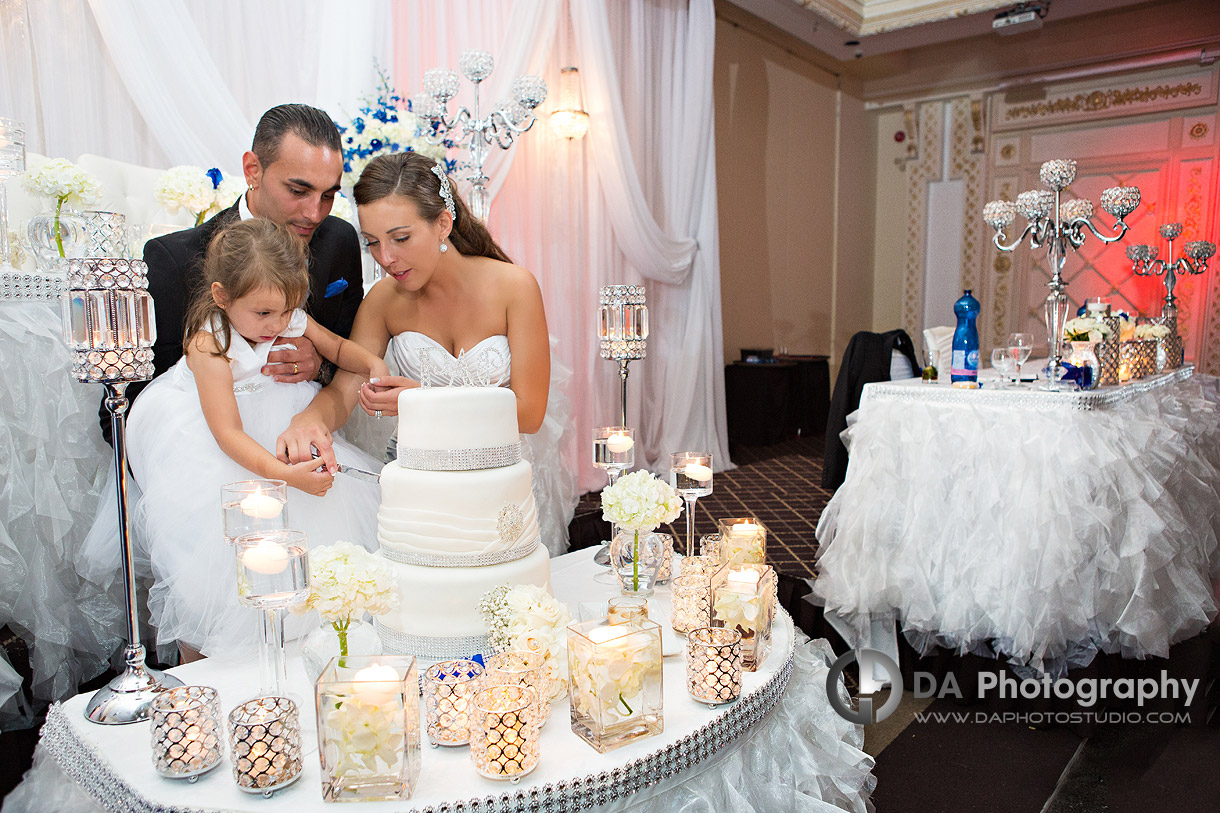 Cake cutting with two ladies on a Italian Wedding reception at Paradise Banquet Hall