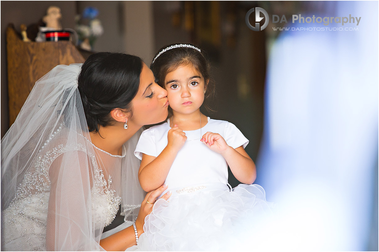 Bride with her flower girl on a wedding day