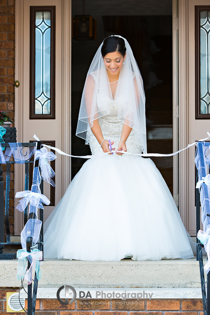 Bride exiting her house on a Italian Style Wedding