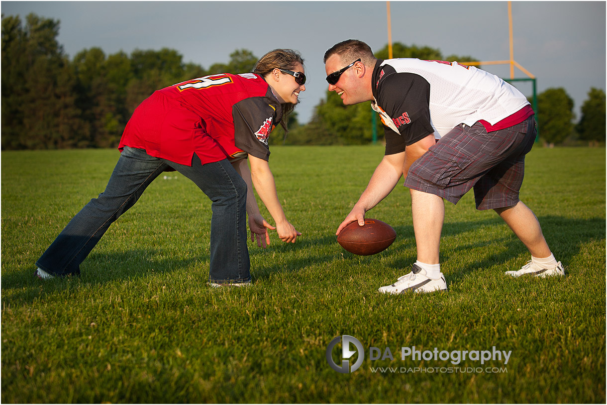 Engagement Couple on the football field