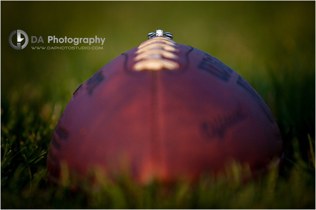 Football field creative engagement ring photo