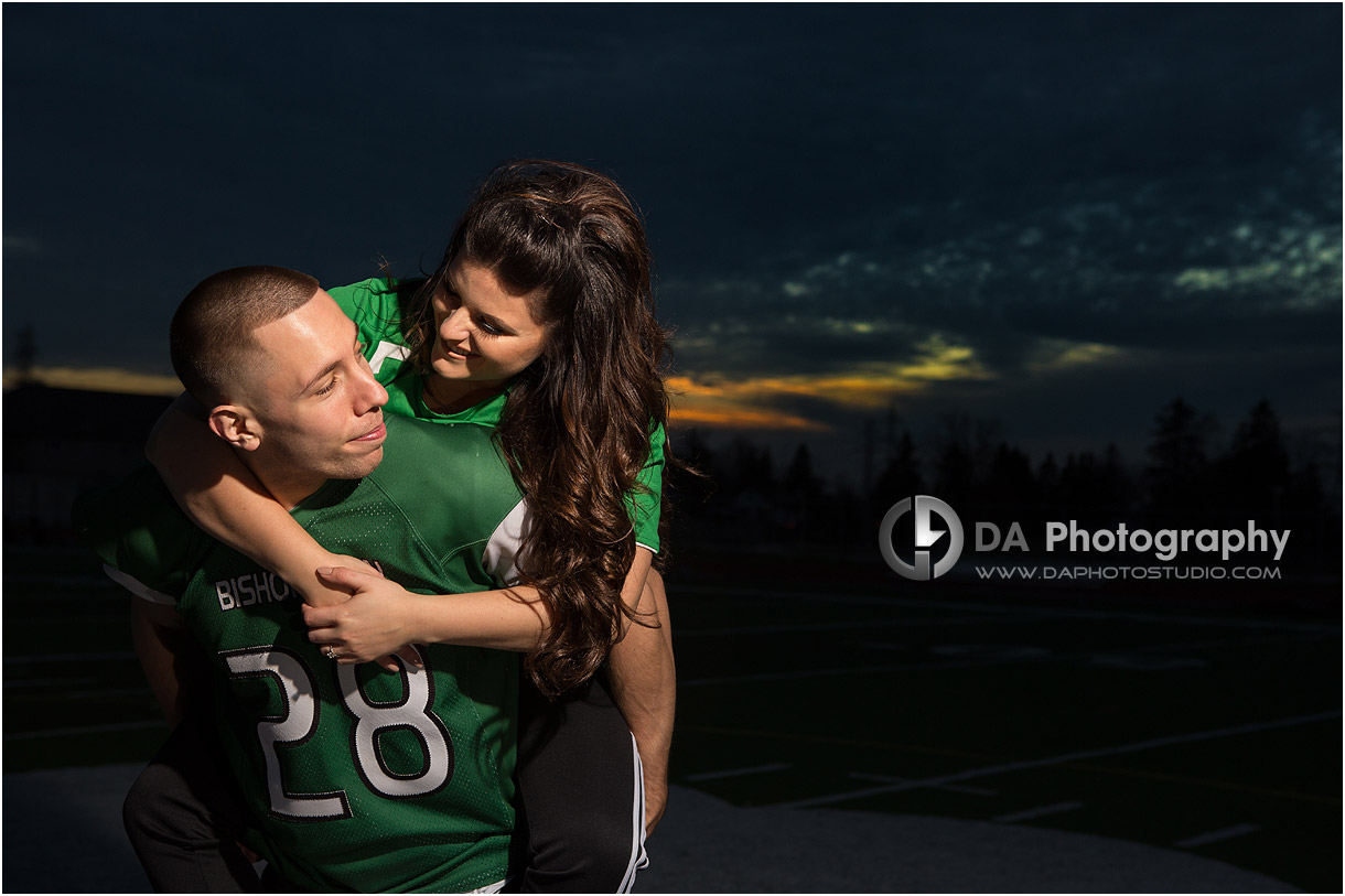 High school engagement in Hamilton on a football field