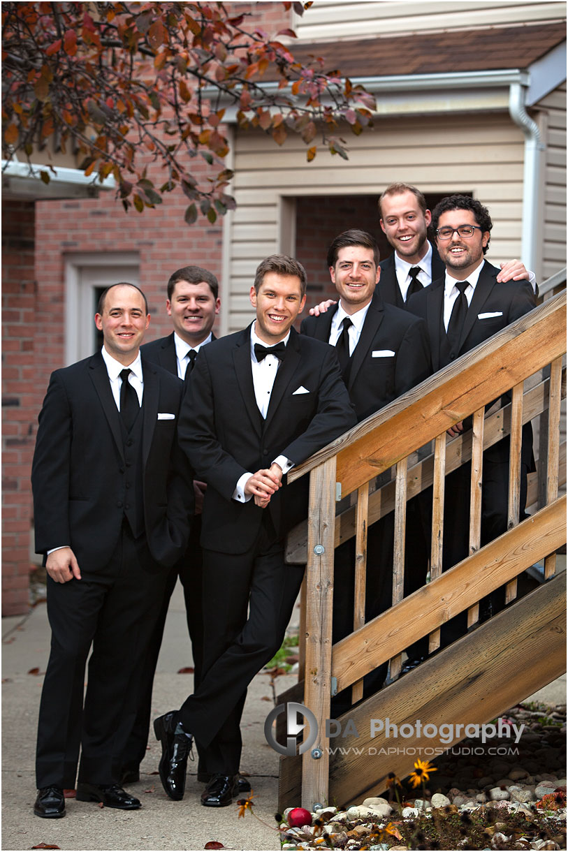 Groom with groomsman's on a winter wedding